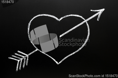 Image of Heart with Cupid's arrow hitting through