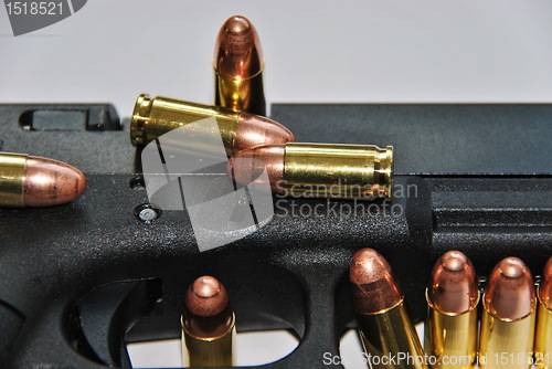 Image of gun and bullets