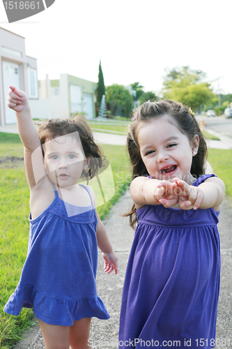 Image of Beautiful little girls enjoying outside 