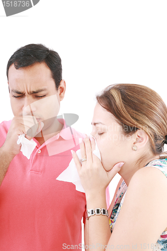 Image of young couple having the flu, isolated over white background 