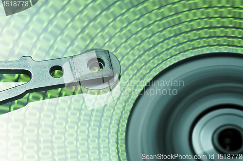 Image of moving hard drive head - one-two