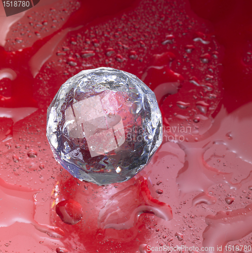 Image of diamond sphere in red wet ambiance