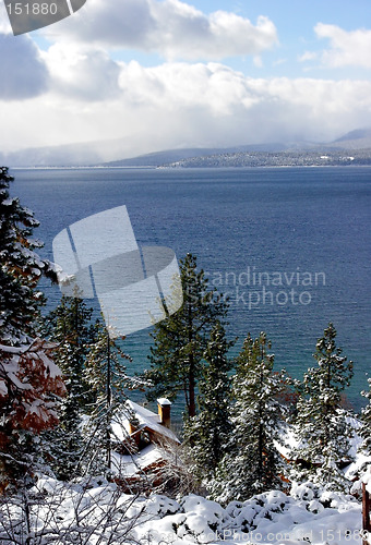 Image of Cabin in the snow woods