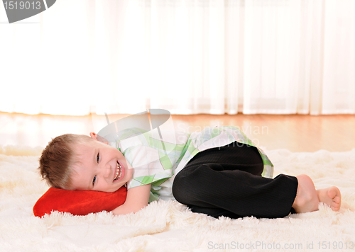 Image of child with a plush heart