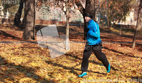 Image of Man running in a park
