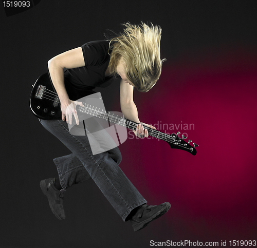 Image of playing bass guitar