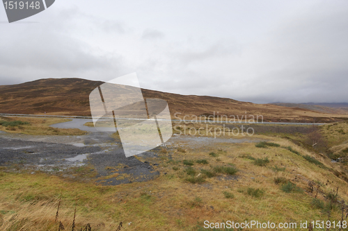 Image of overgrown hilly scenery near Ullapool