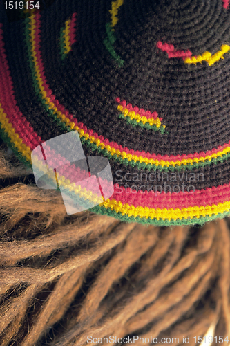 Image of rasta cap and dreadlocks