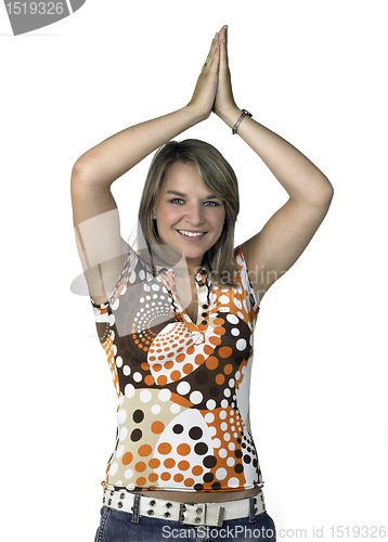 Image of blond girl clapping her hands over head