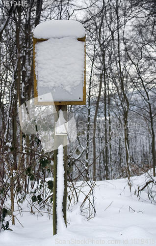 Image of snow covered sign