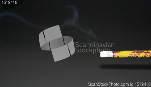 Image of smoking joss stick