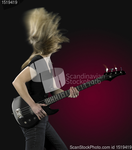 Image of playing bass guitar