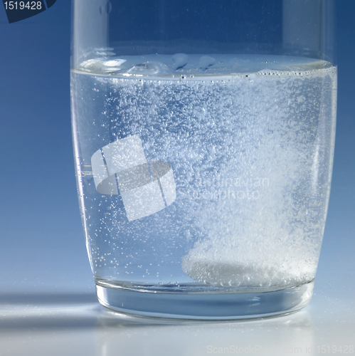 Image of fizzy tablet in a glass of water