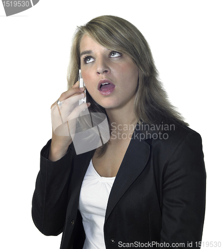 Image of cute blonde girl talking at mobile phone