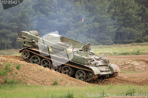 Image of tank on hilly ground