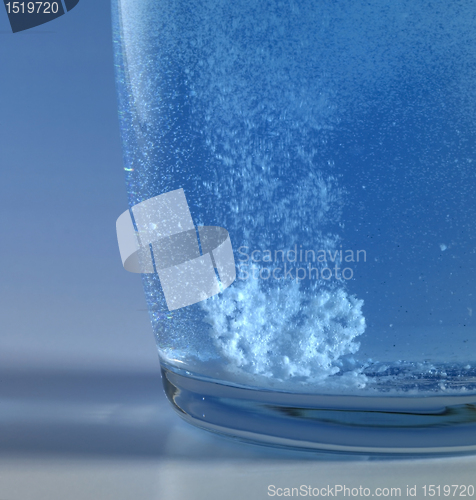 Image of fizzy tablet in a glass of water