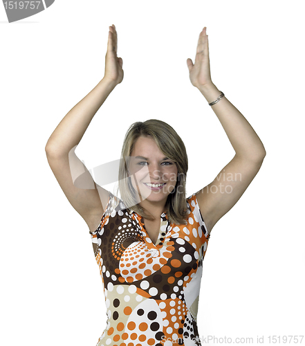 Image of blond girl clapping her hands over head