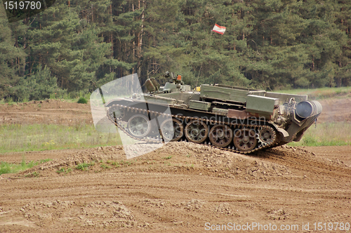 Image of offroad scenery with driving tank