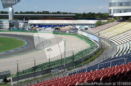 Image of racetrack tribune at summer time