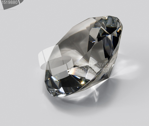 Image of clear diamond in light back