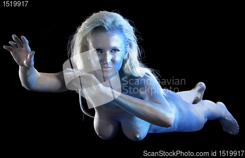 Image of blue bodypainted woman and fabrics