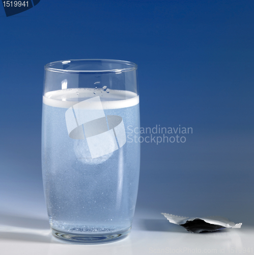 Image of fizzy tablet in a glass of water