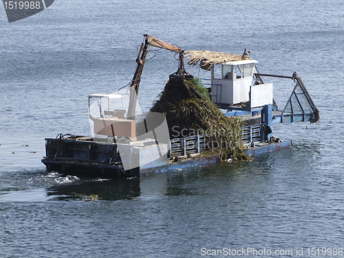 Image of cleaning ship on water surface