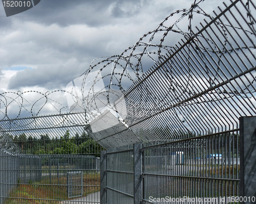 Image of safety fence and dramatic sky