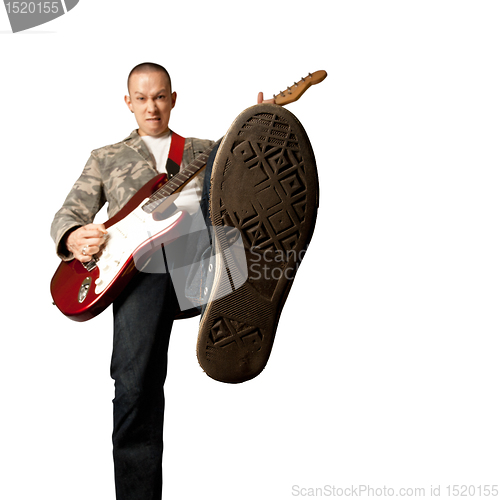 Image of rocker with guitar and foot