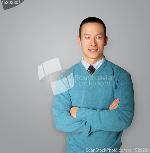 Image of young businessman smiles