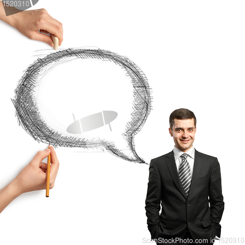 Image of human hands with speech bubble and man