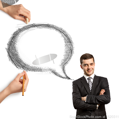 Image of human hands with speech bubble and man