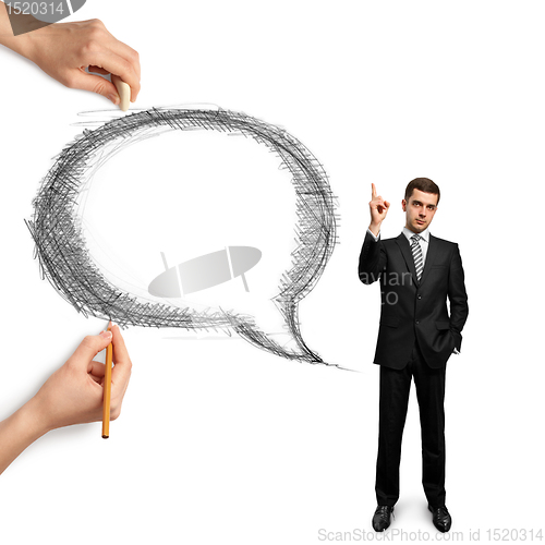 Image of human hands with speech bubble and man