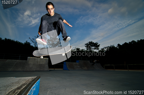Image of Skateboarder on a flip trick