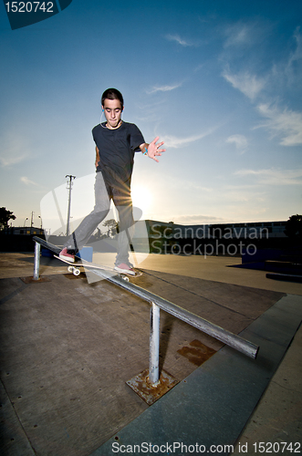 Image of Skateboarder on a slide