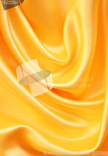 Image of Smooth elegant golden silk as background 