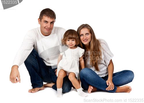 Image of happy family sitting in the studio