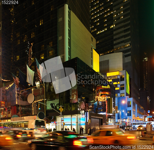 Image of city life with Times Square at night
