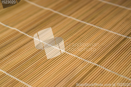 Image of brown wooden mat