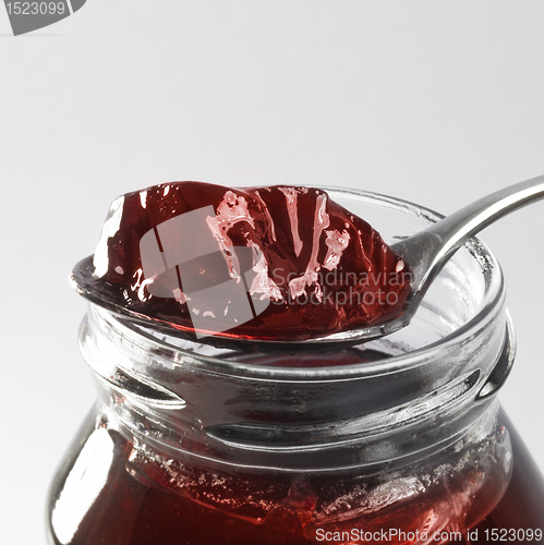 Image of jelly with glass and spoon