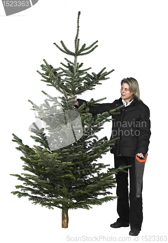Image of woman and christmas tree