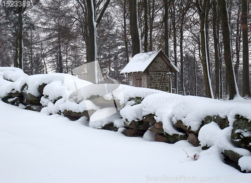 Image of small shack in winter ambiance