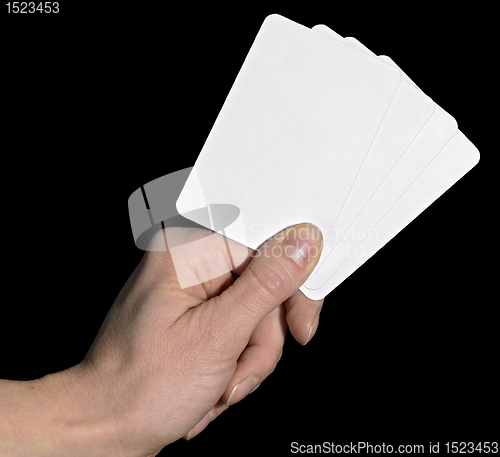 Image of hand and spread cards