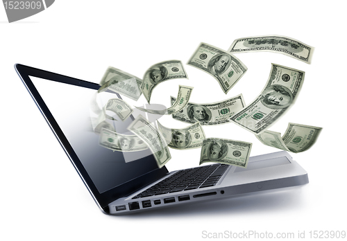 Image of Money pouring out from a notebook computer