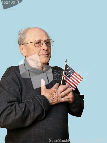 Image of Senior man with american flag isolated