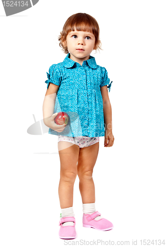 Image of little girl with an apple in studio isolated