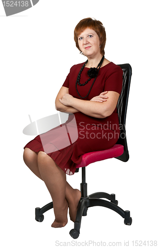 Image of middle-aged woman in a chair