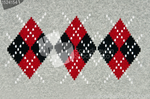 Image of knitted gray background with a pattern