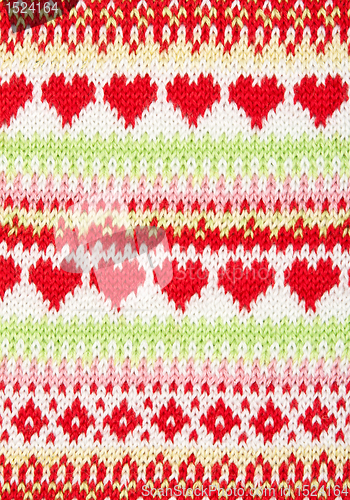 Image of knitted background with a pattern in the shape of heart