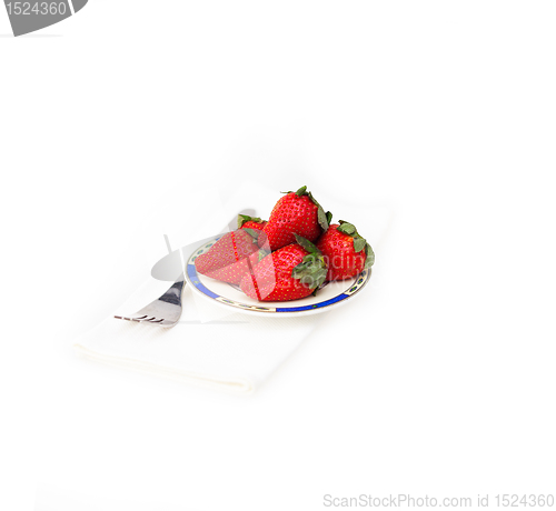 Image of fresh strawberries dish over white